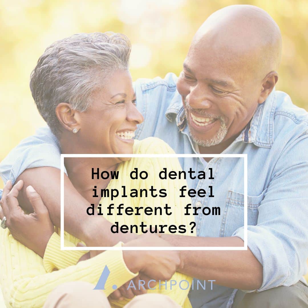 Do implants feel different than dentures?